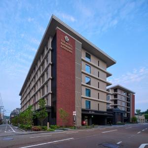 a building on the side of a street at THE HOTEL SANRAKU KANAZAWA 21th December 2022 OPEN in Kanazawa