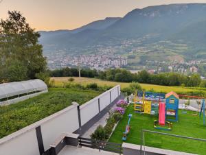 a playground on the roof of a house at Villa SHAMS in Travnik