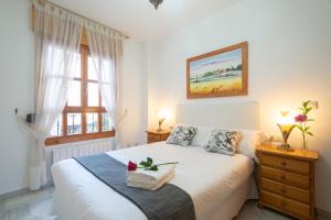 Postel nebo postele na pokoji v ubytování APARTAMENTO ADULTOS CENTRO N V 1 free parking
