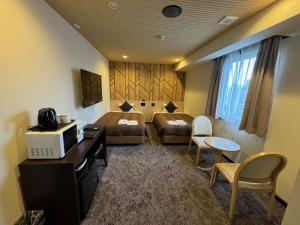 Posezení v ubytování HOTEL LiVEMAX Kyoto Gojo