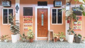 Fotografie z fotogalerie ubytování RedDoorz at Queens Hometel v destinaci Tagum