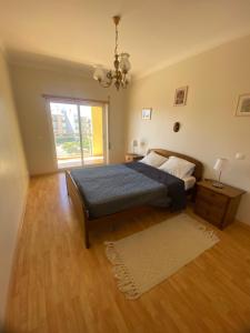 Ένα ή περισσότερα κρεβάτια σε δωμάτιο στο Two bedroom apartment with pool +16 φωτογραφίες