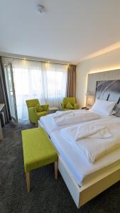 Postel nebo postele na pokoji v ubytování Hotel Gierer