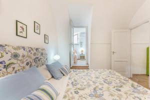 Postel nebo postele na pokoji v ubytování Il Palazzo