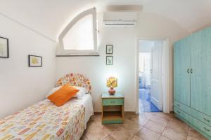 Postel nebo postele na pokoji v ubytování Il Palazzo