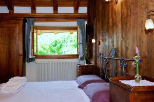 Postel nebo postele na pokoji v ubytování La Vrille - chambres d'hôtes