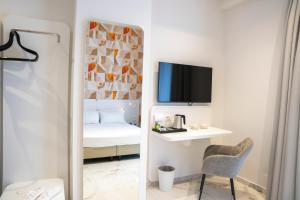 TV a/nebo společenská místnost v ubytování Soul Art Hotel