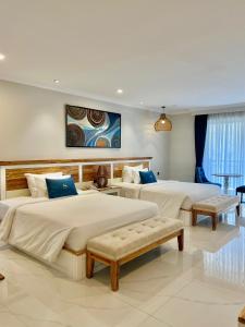 Postel nebo postele na pokoji v ubytování Sabina Luxury Boutique Hotel & Villa