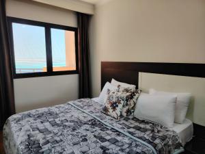 Postel nebo postele na pokoji v ubytování Sea View Apartment