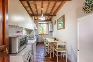 Køkken eller tekøkken på Brown apartment Siena