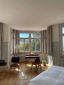 Postel nebo postele na pokoji v ubytování Militärkantine St. Gallen