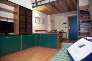A bed or beds in a room at Hotel Fontana Olente