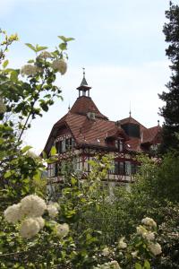 a gazebo with a cross on top of it at Militärkantine St. Gallen in St. Gallen