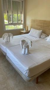 Postel nebo postele na pokoji v ubytování Hotel Algorfa