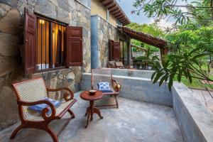 Balkón nebo terasa v ubytování Queens Mount Tri Villas