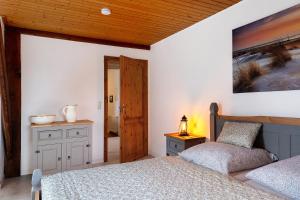 Postel nebo postele na pokoji v ubytování Grodenhof