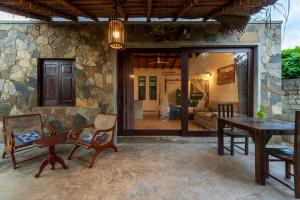 Patio nebo venkovní prostory v ubytování Queens Mount Tri Villas
