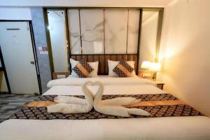 Postel nebo postele na pokoji v ubytování Hotel Clink New Delhi Airport