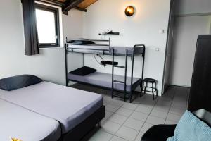 Postel nebo postele na pokoji v ubytování Brouwersdam Stay
