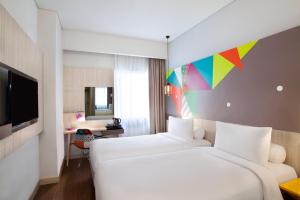 Voodi või voodid majutusasutuse Ibis Styles Jakarta Sunter toas