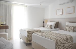 Posteľ alebo postele v izbe v ubytovaní Evangelia Rooms & Αpartments - B