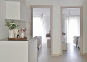 Posteľ alebo postele v izbe v ubytovaní Evangelia Rooms & Αpartments - B