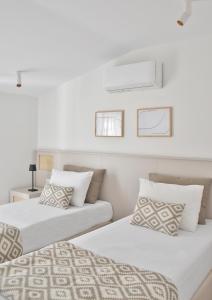 Posteľ alebo postele v izbe v ubytovaní Evangelia Rooms & Αpartments - B