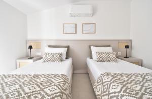 Posteľ alebo postele v izbe v ubytovaní Evangelia Rooms & Αpartments - B