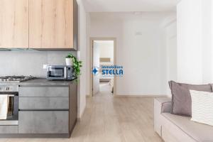 A kitchen or kitchenette at Condominio Trento