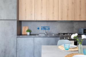 A kitchen or kitchenette at Condominio Trento