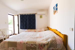 Postel nebo postele na pokoji v ubytování Casa Leahu