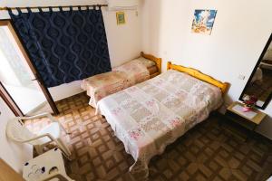 Postel nebo postele na pokoji v ubytování Casa Leahu