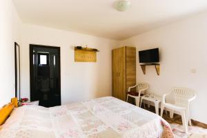 Postel nebo postele na pokoji v ubytování Casa Leahu + 17 fotografií