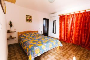 Postel nebo postele na pokoji v ubytování Casa Leahu