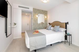 Postel nebo postele na pokoji v ubytování Hotel Vibra Palma Cactus