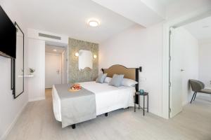 Postel nebo postele na pokoji v ubytování Hotel Vibra Palma Cactus