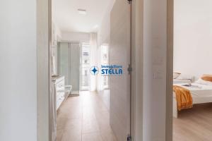 A bed or beds in a room at Condominio Trento