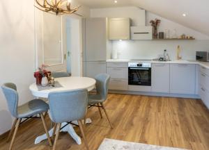 Kuchyň nebo kuchyňský kout v ubytování Berge, Balkon und top Ausstattung mitten in Sonthofen JS2 + 8 fotografií