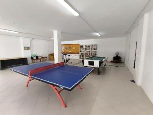 a large room with a ping pong table in it at TAGARA - 2 pools, ocean view, Puerto de Santiago in Puerto de Santiago