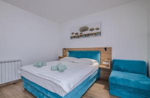 Postel nebo postele na pokoji v ubytování B&B Šegulja