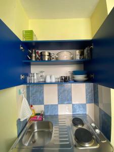 Kuchyň nebo kuchyňský kout v ubytování Apartments Dunja