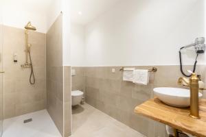 Koupelna v ubytování Aviano Boutique Hotel