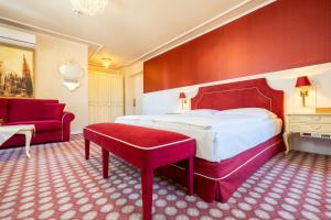 Postel nebo postele na pokoji v ubytování Aviano Boutique Hotel