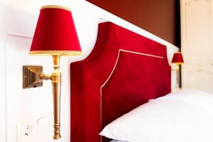 Postel nebo postele na pokoji v ubytování Aviano Boutique Hotel