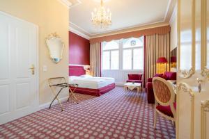 Postel nebo postele na pokoji v ubytování Aviano Boutique Hotel + 37 fotografií