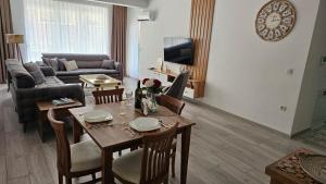 Posezení v ubytování Value Living Apartment