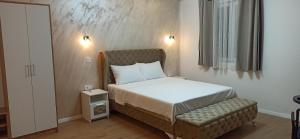 Postel nebo postele na pokoji v ubytování Apartman Andjela
