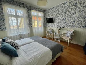 Katil atau katil-katil dalam bilik di Nautic Hotell