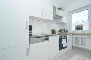 Η κουζίνα ή μικρή κουζίνα στο RT04-FW Wohnung in Schwanstetten