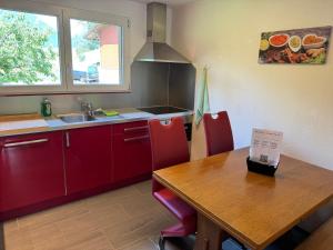 Kuchyň nebo kuchyňský kout v ubytování See und Berge Loft